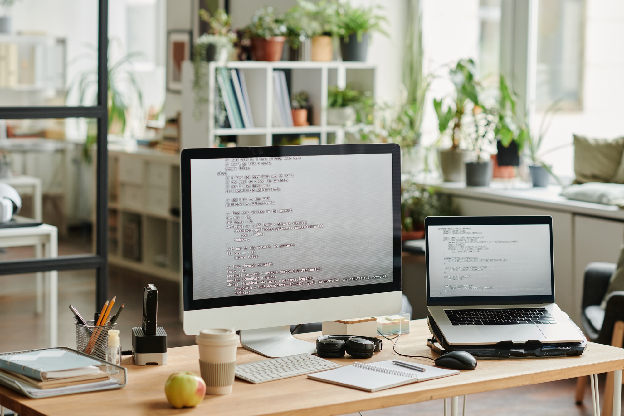 Workplace of modern IT support engineer with computers
